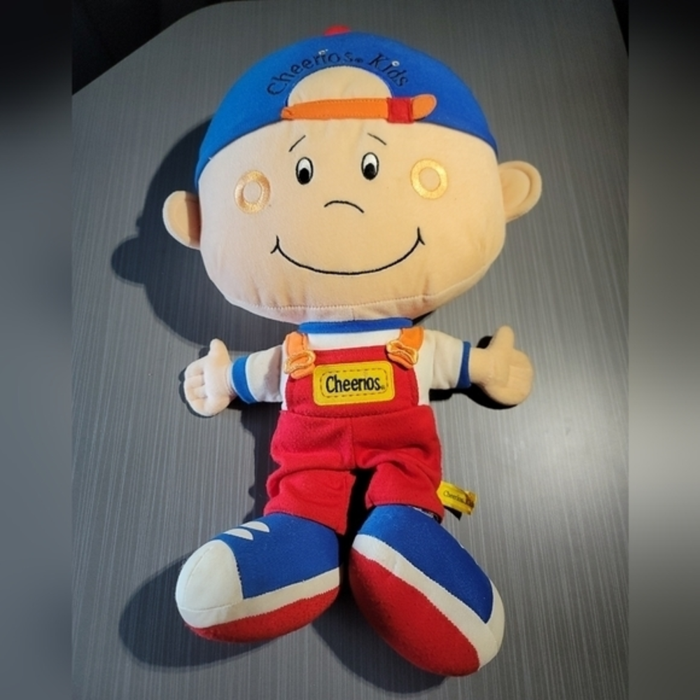 18" Cheerios Kid Plush Toy.‎ Used In Fair/Good Condition.